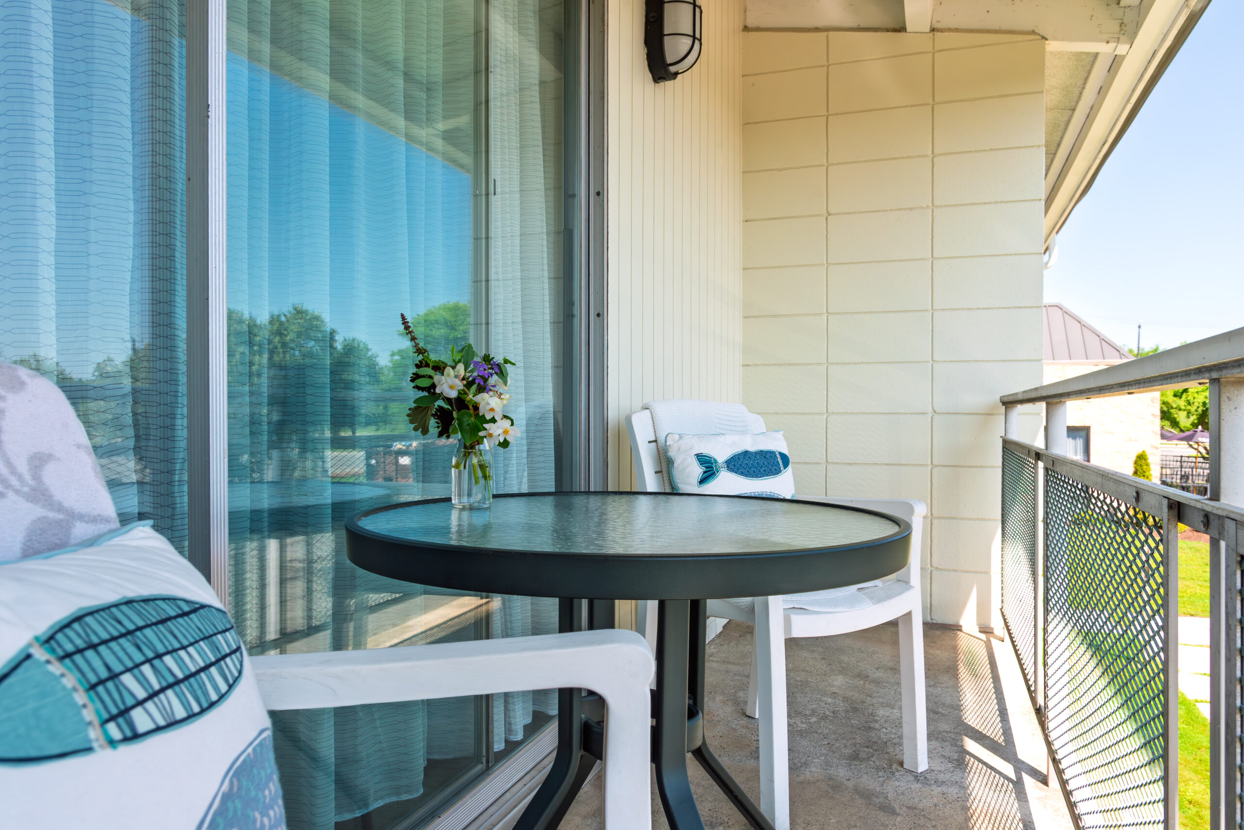 Private balcony with table and chairs at The Residences, Hadley, MA