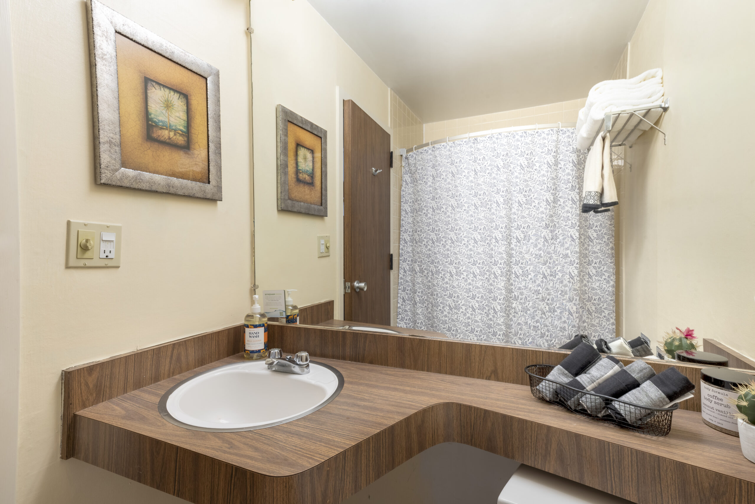 Private bathroom with sink and shower at The Residences, Hadley, MA