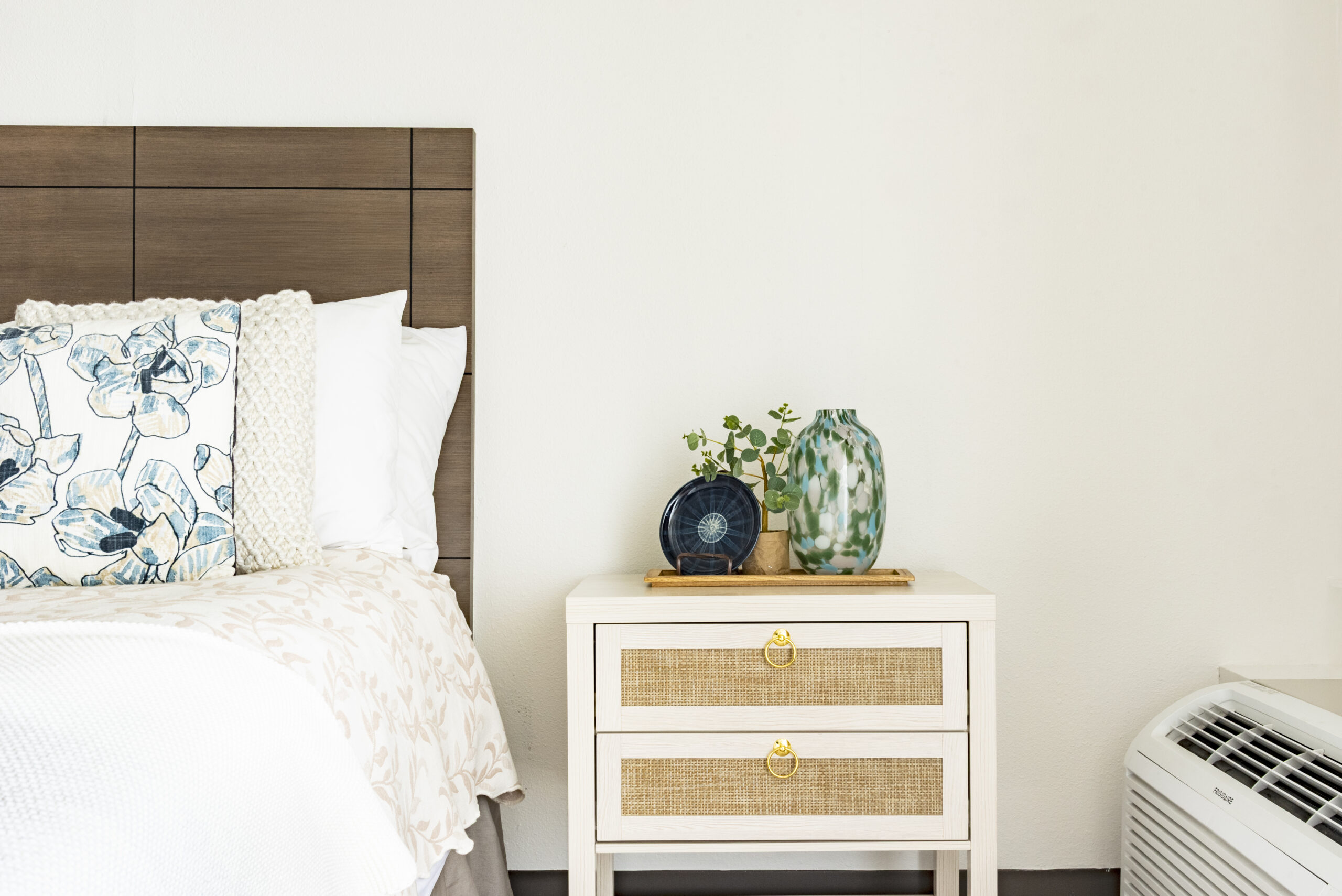 Upholstered headboard and nightstand at The Residences, Hadley, MA